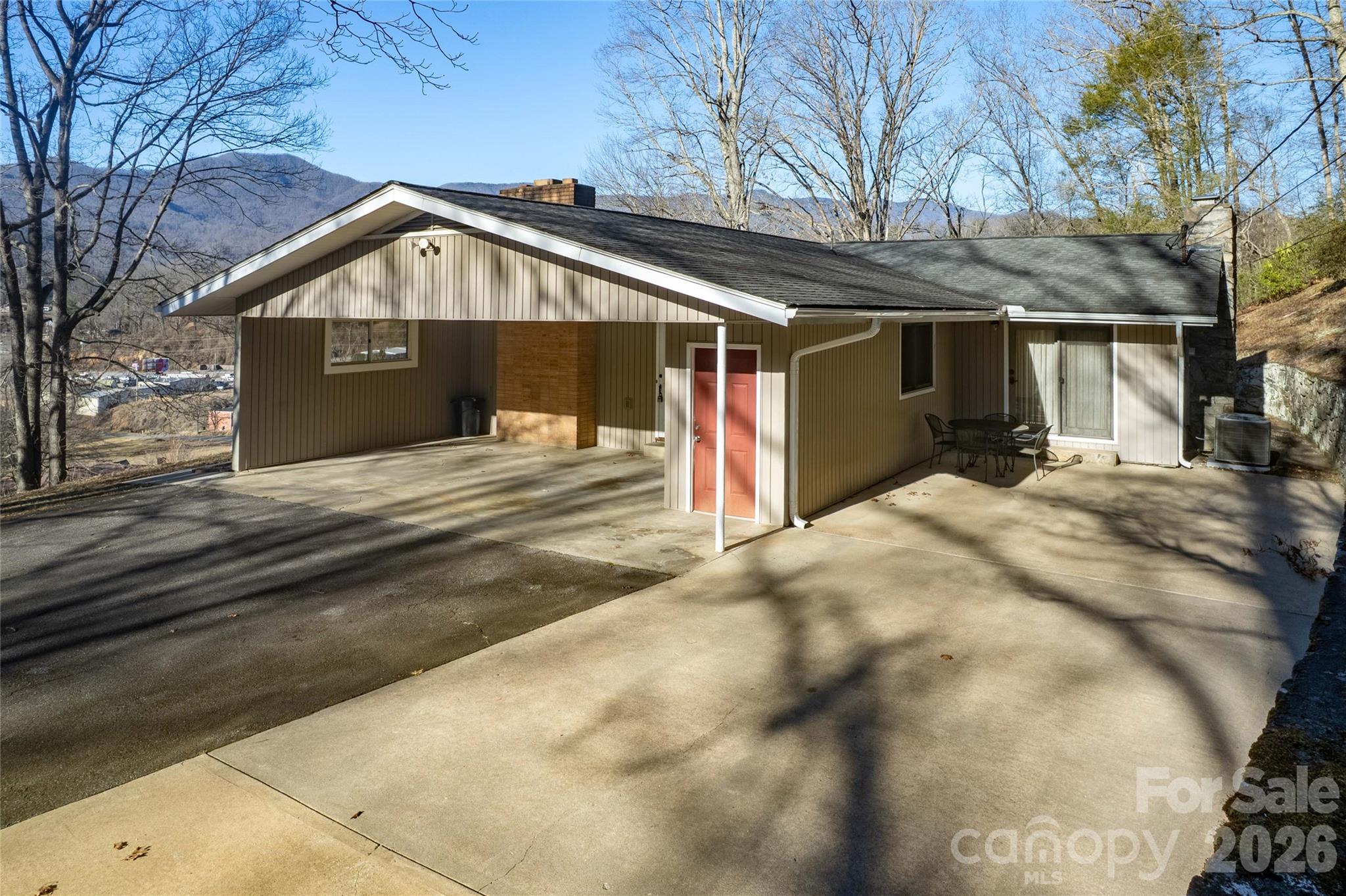 223 Cherry Street Sylva, NC 28779 - Photo 8 of 29 a front view of a house with a yard