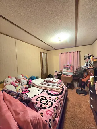 a very nice looking bedroom with a bed