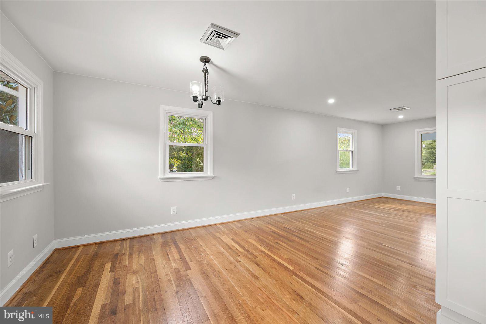 31655 Morris Leonard Road Parsonsburg, MD 21849 - Photo 30 of 90 wooden floor in an empty room with a window