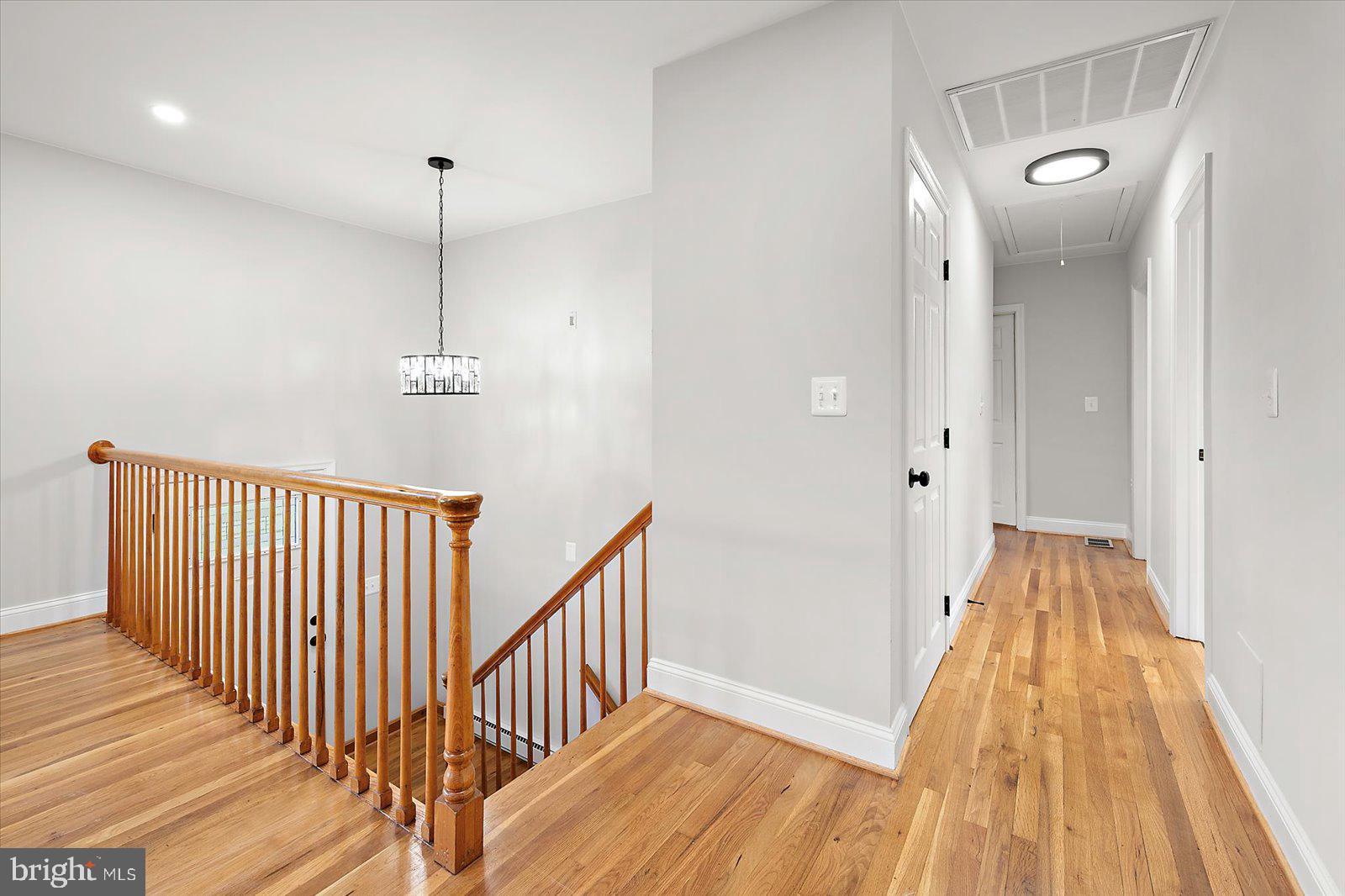 31655 Morris Leonard Road Parsonsburg, MD 21849 - Photo 31 of 90 a view of a hallway with wooden floor