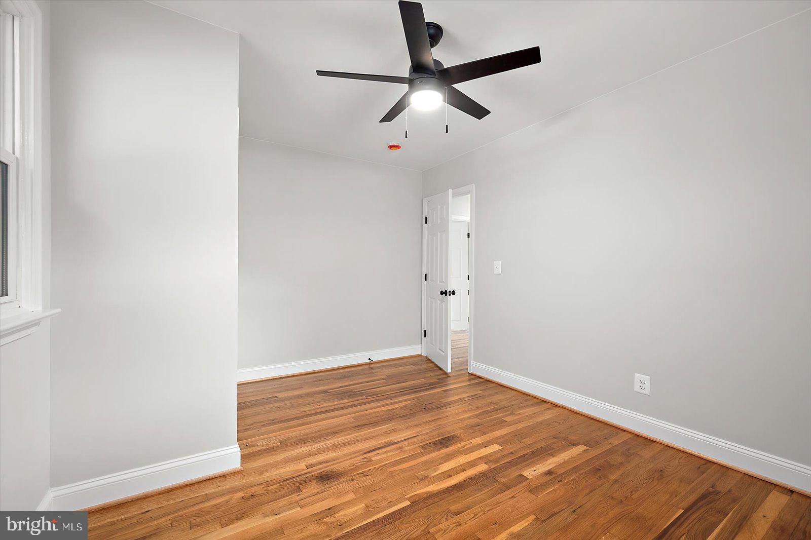 31655 Morris Leonard Road Parsonsburg, MD 21849 - Photo 37 of 90 a view of room with wooden floor and fan