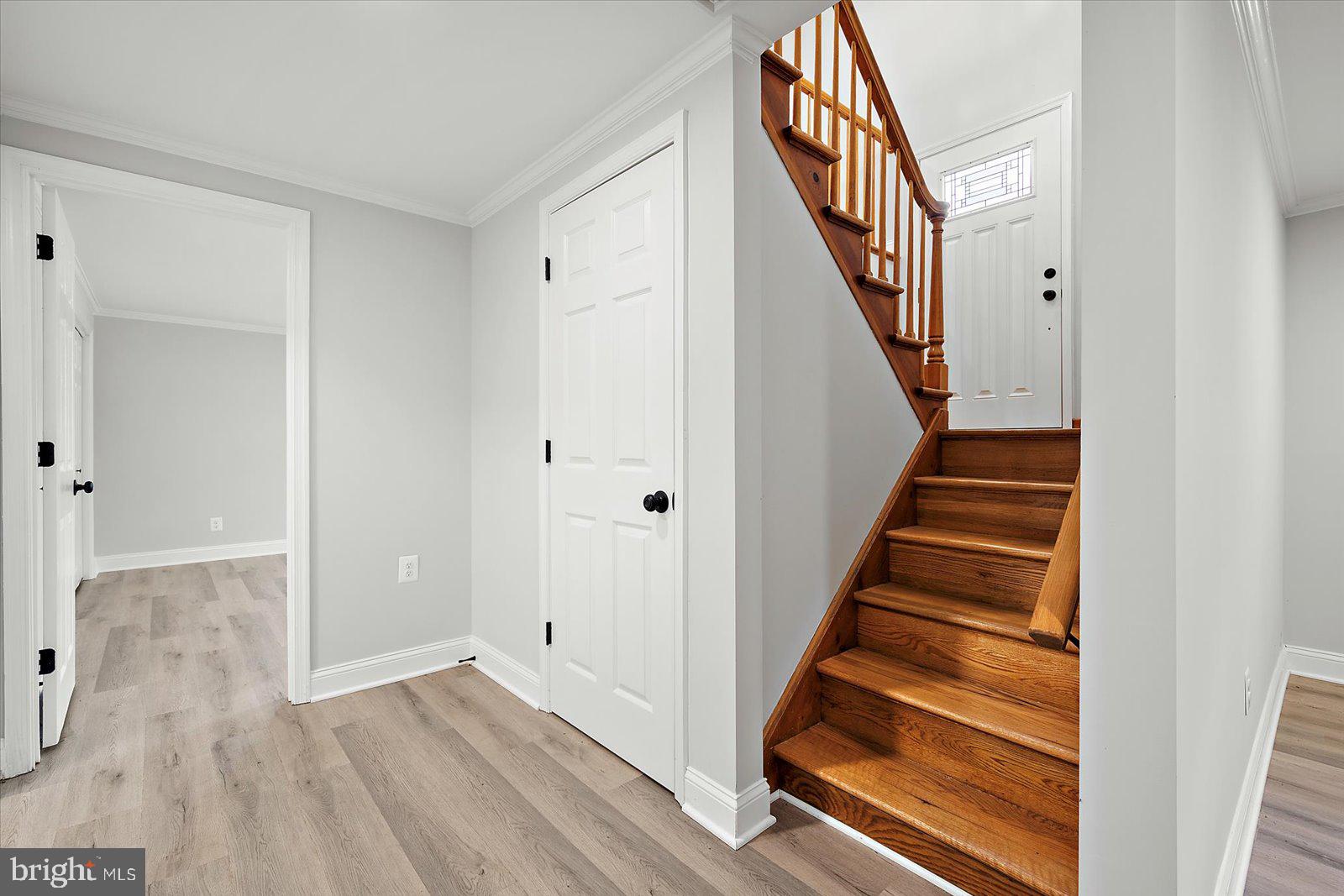 31655 Morris Leonard Road Parsonsburg, MD 21849 - Photo 42 of 90 a view of a hallway with wooden floor and entryway