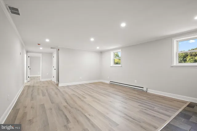 a view of a house with swimming pool and a yard