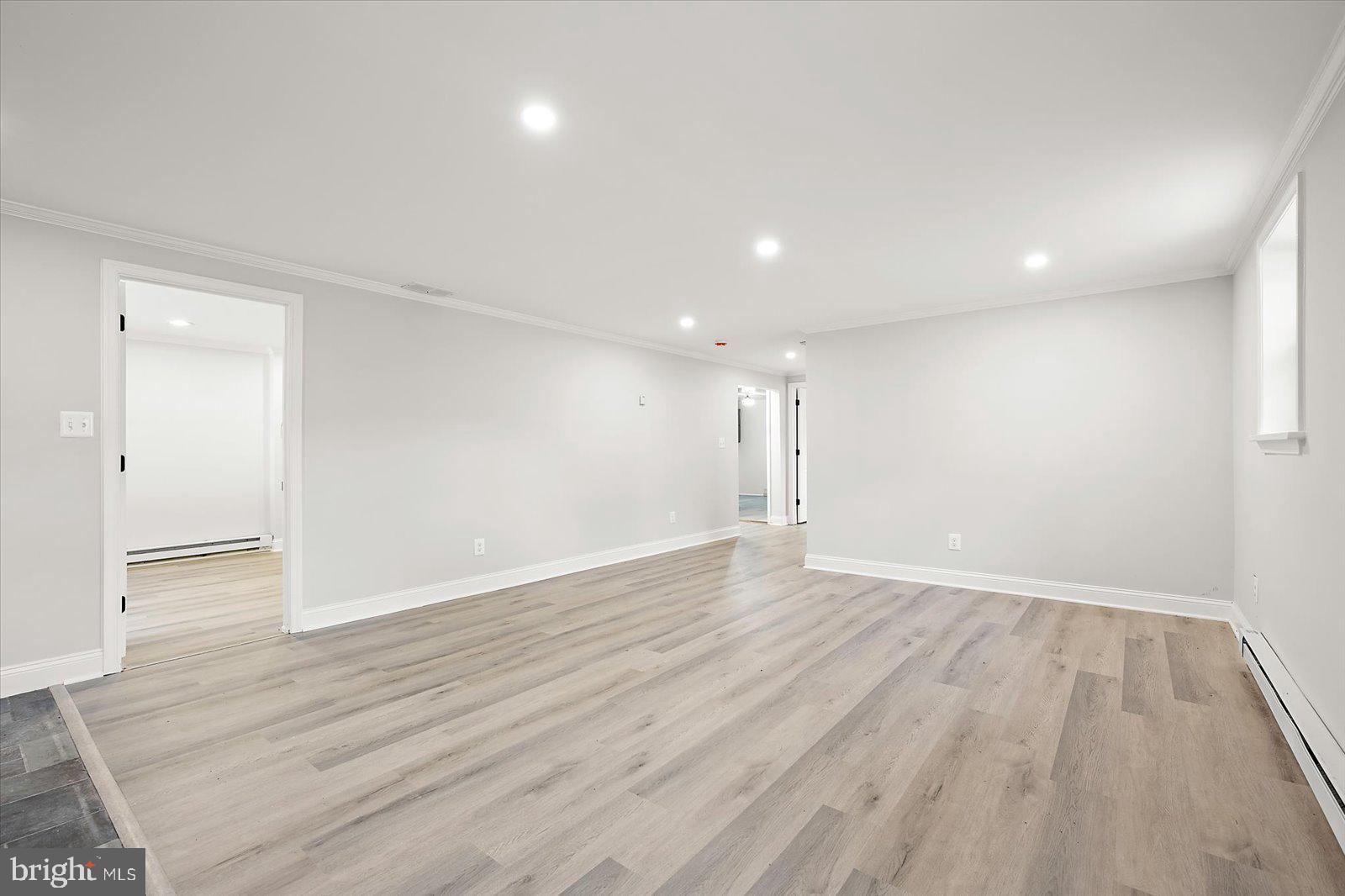 31655 Morris Leonard Road Parsonsburg, MD 21849 - Photo 48 of 90 a view of an empty room with wooden floor