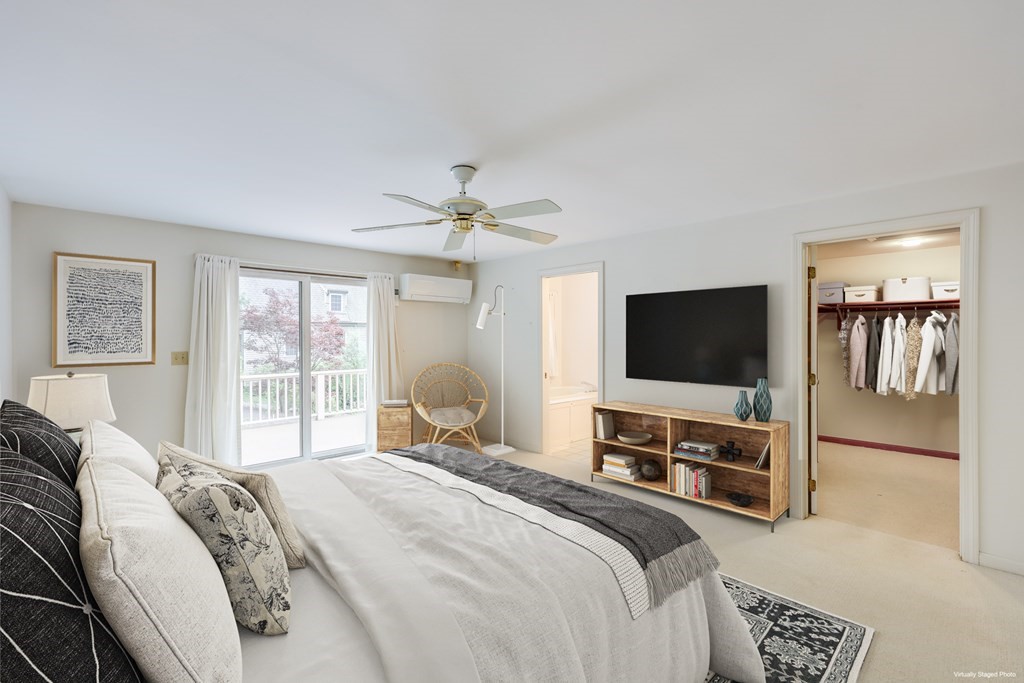 103 Dory Circle Barnstable, MA 02648 - Photo 17 of 42 a bedroom with a bed and a flat screen tv