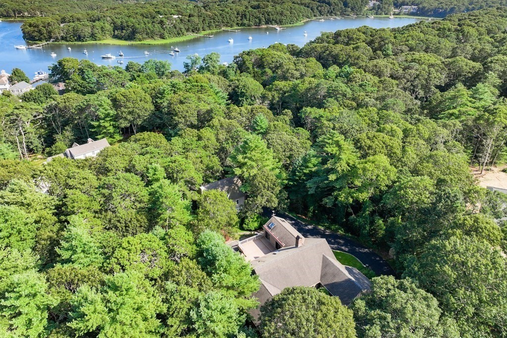 103 Dory Circle Barnstable, MA 02648 - Photo 2 of 42 an aerial view of a house with a yard and outdoor seating