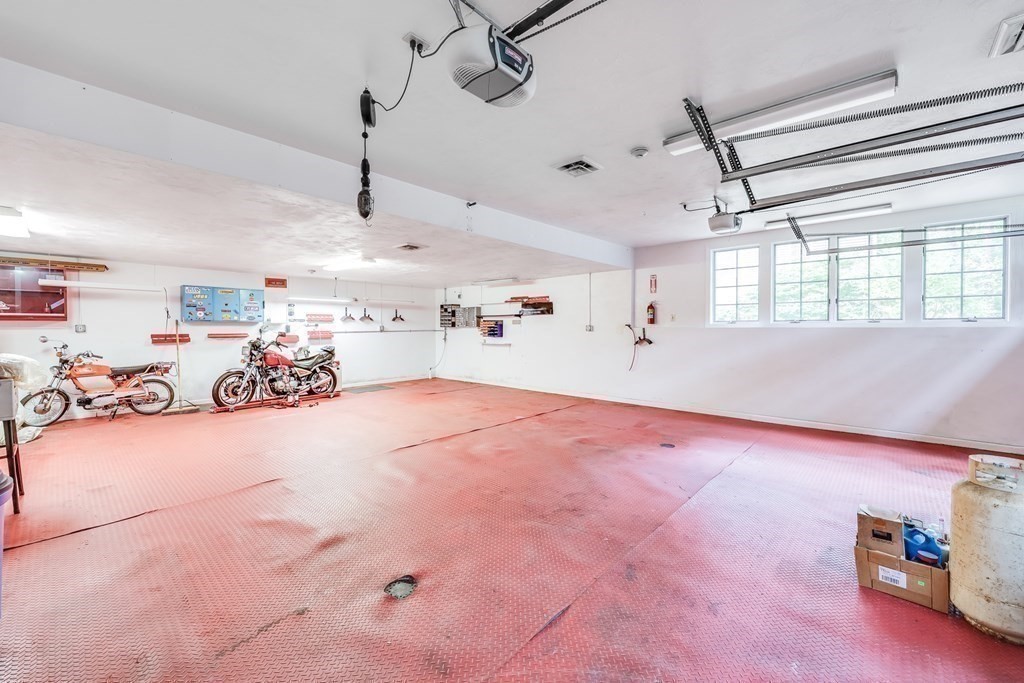 103 Dory Circle Barnstable, MA 02648 - Photo 26 of 42 a very nice looking room with lots of white furniture a chandelier and a window