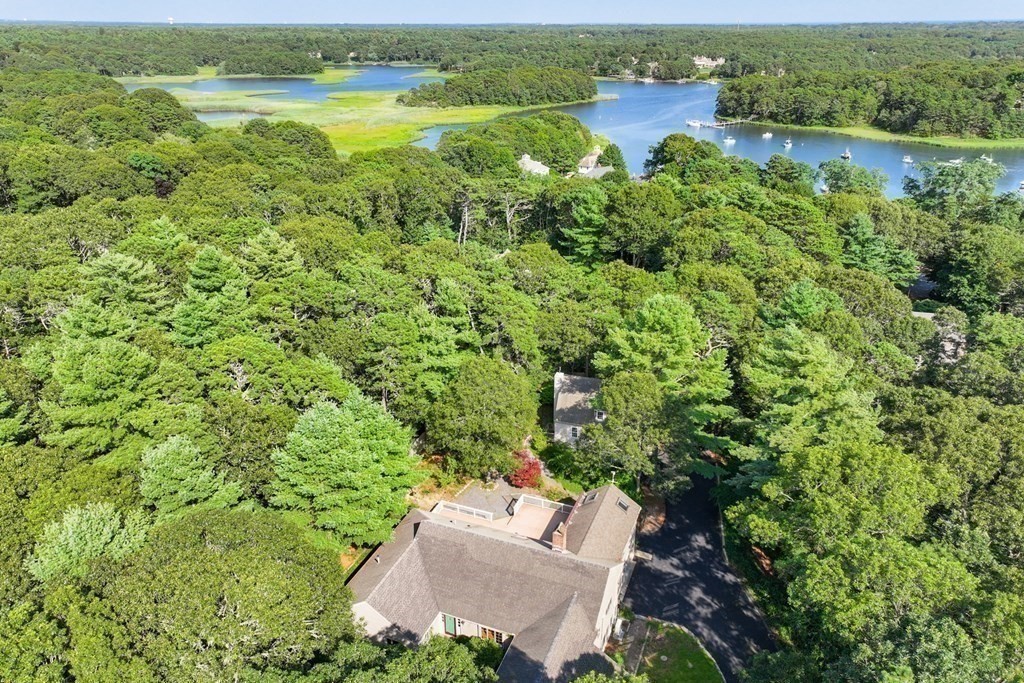 103 Dory Circle Barnstable, MA 02648 - Photo 39 of 42 an aerial view of a house with a yard and lake view