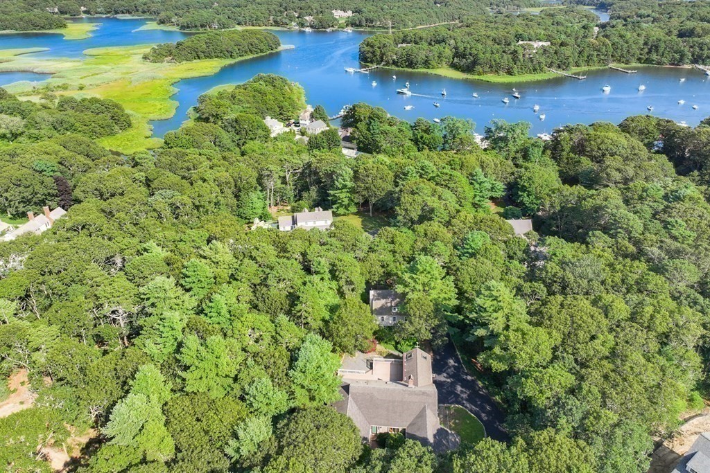 103 Dory Circle Barnstable, MA 02648 - Photo 40 of 42 a view of a house with a yard and sitting area