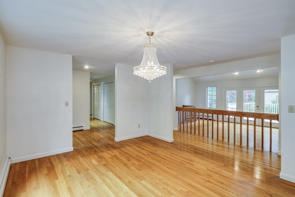 103 Dory Circle Barnstable, MA 02648 - Photo 8 of 42 a view of empty room with wooden floor