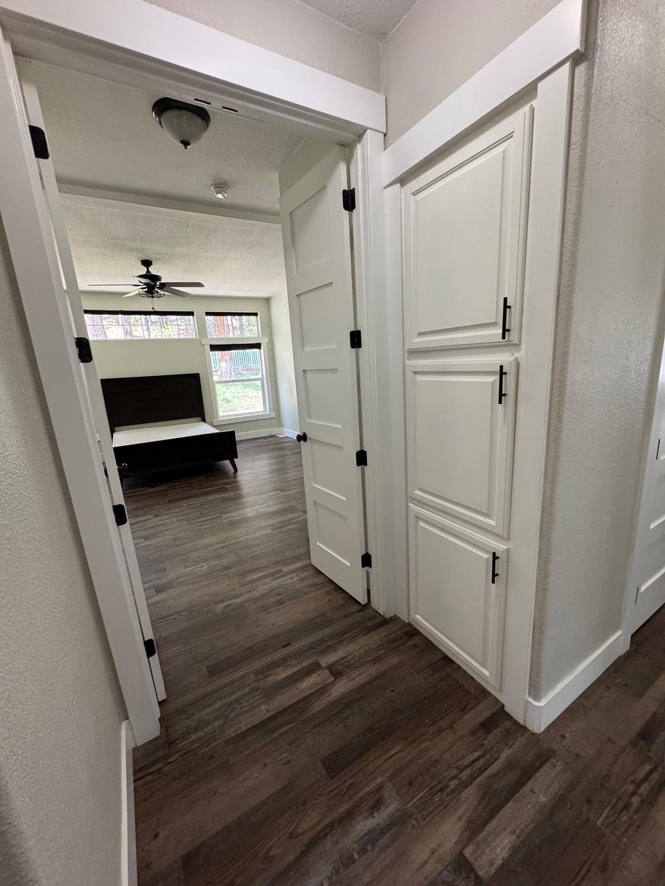 4678 Portola McLears Road Clio, CA 96106 - Photo 15 of 33 a view of a hallway view with wooden floor and staircase