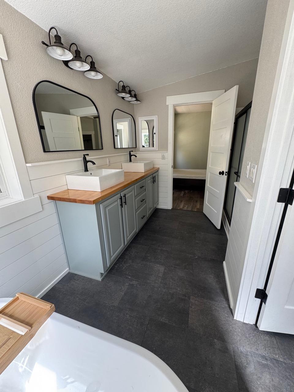 4678 Portola McLears Road Clio, CA 96106 - Photo 19 of 33 a bathroom with a sink and mirror