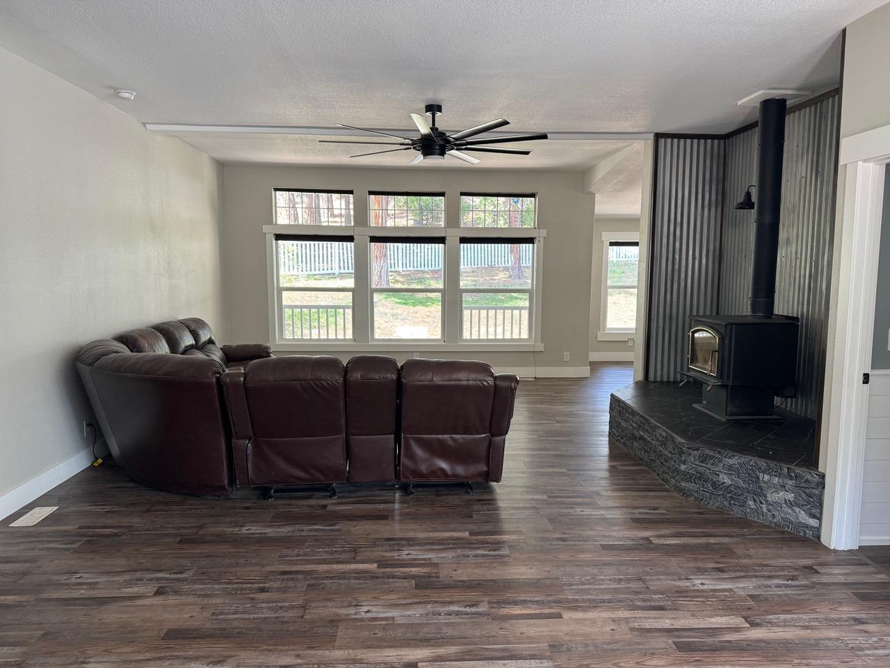 4678 Portola McLears Road Clio, CA 96106 - Photo 5 of 33 a living room with couches and wooden floor