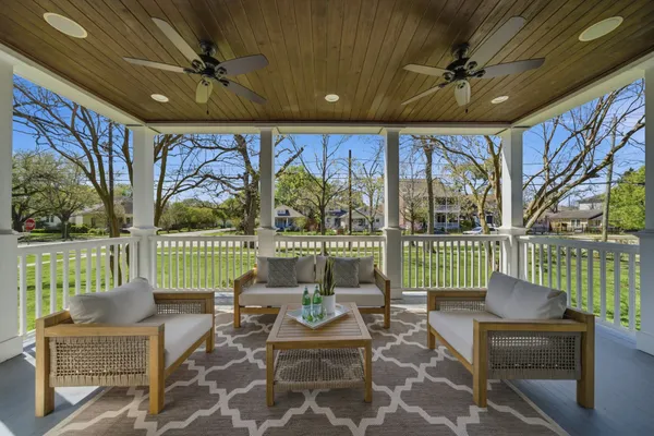 a building outdoor space with patio furniture and a potted plant