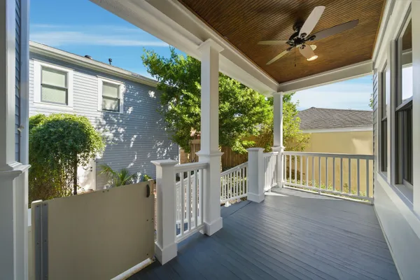 a view of a balcony with chairs