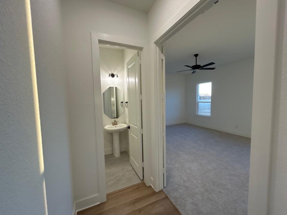 810 Vly Rdg Road Van Alstyne, TX 75495 - Photo 5 of 13 a view of a bathroom from the hallway