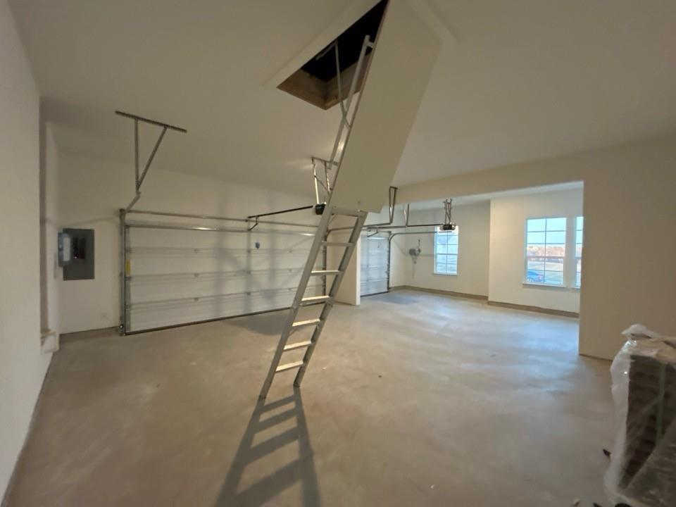 810 Vly Rdg Road Van Alstyne, TX 75495 - Photo 8 of 13 a view of a room with rack and a window