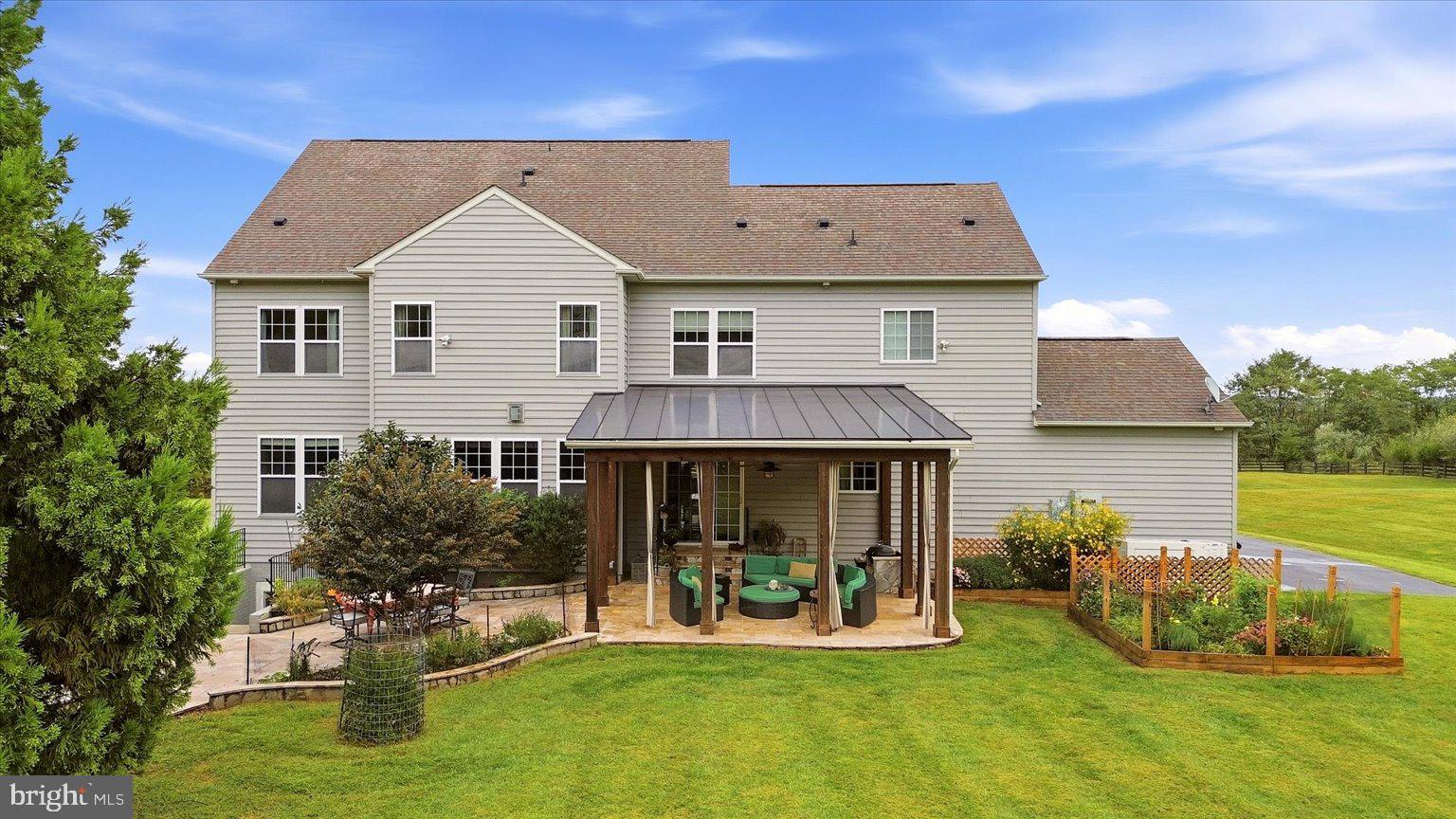 15547 Montresor Road Leesburg, VA 20176 - Photo 79 of 92 Rear elevation with covered patio