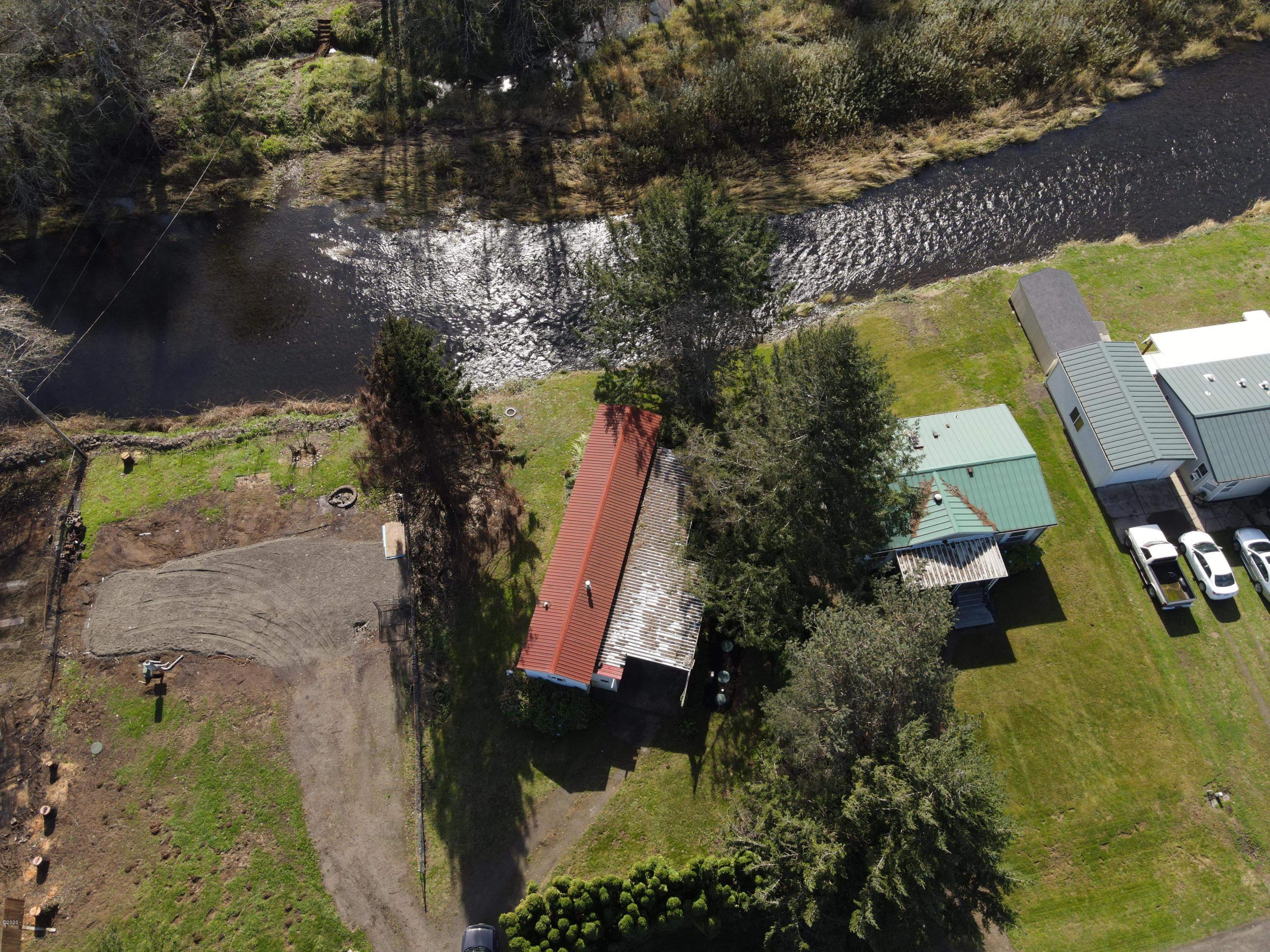 918 North River Bend Road Otis, OR 97368 - Photo 16 of 17 overhead red roof