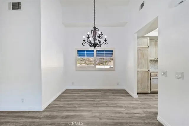 a view of a hallway with washer and dryer