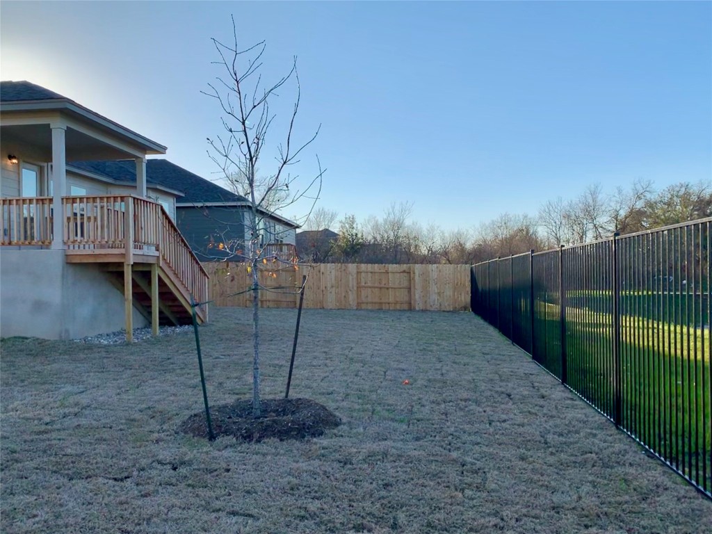 265 Falling Star Lane Georgetown, TX 78628 - Photo 11 of 22 a view of backyard and entertaining space