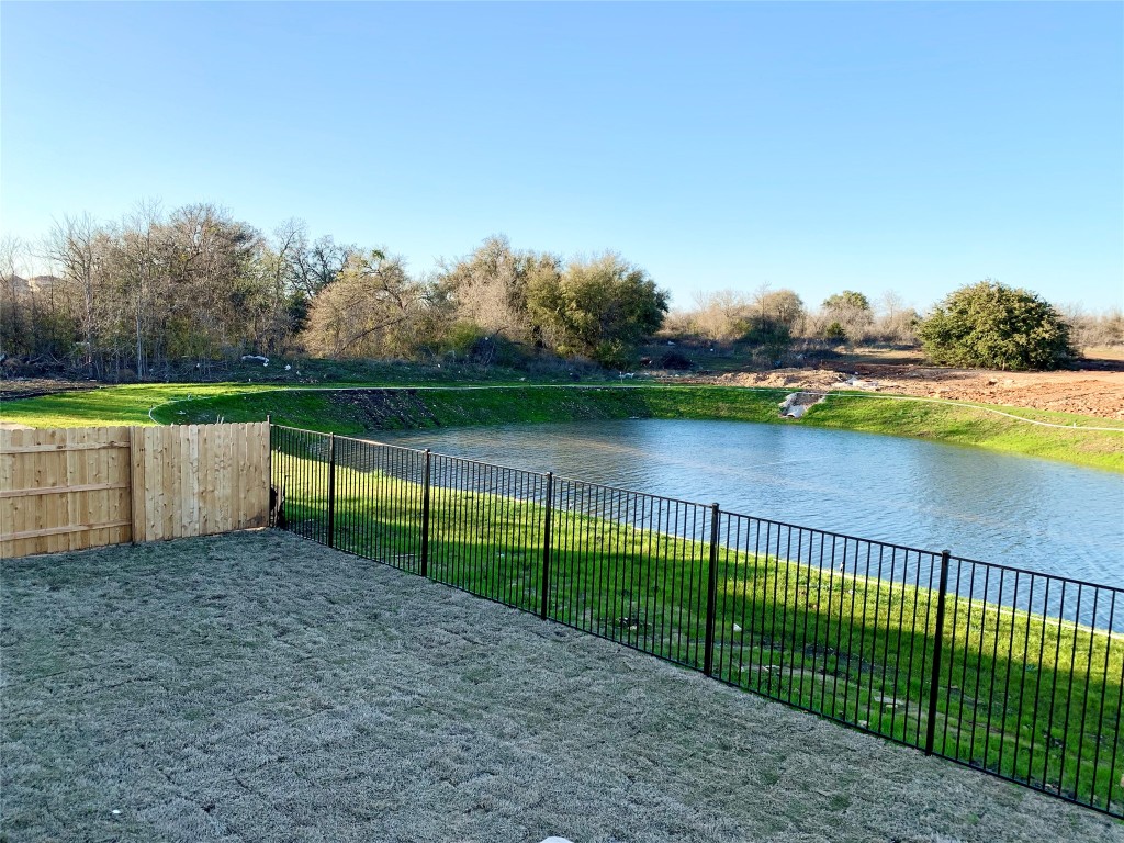 265 Falling Star Lane Georgetown, TX 78628 - Photo 12 of 22 a view of park with iron fence