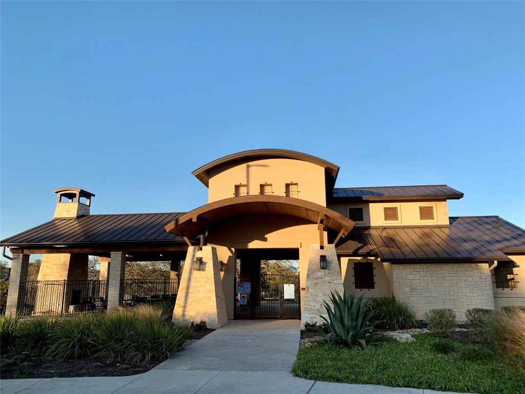 265 Falling Star Lane Georgetown, TX 78628 - Photo 18 of 22 a front view of a house with garden