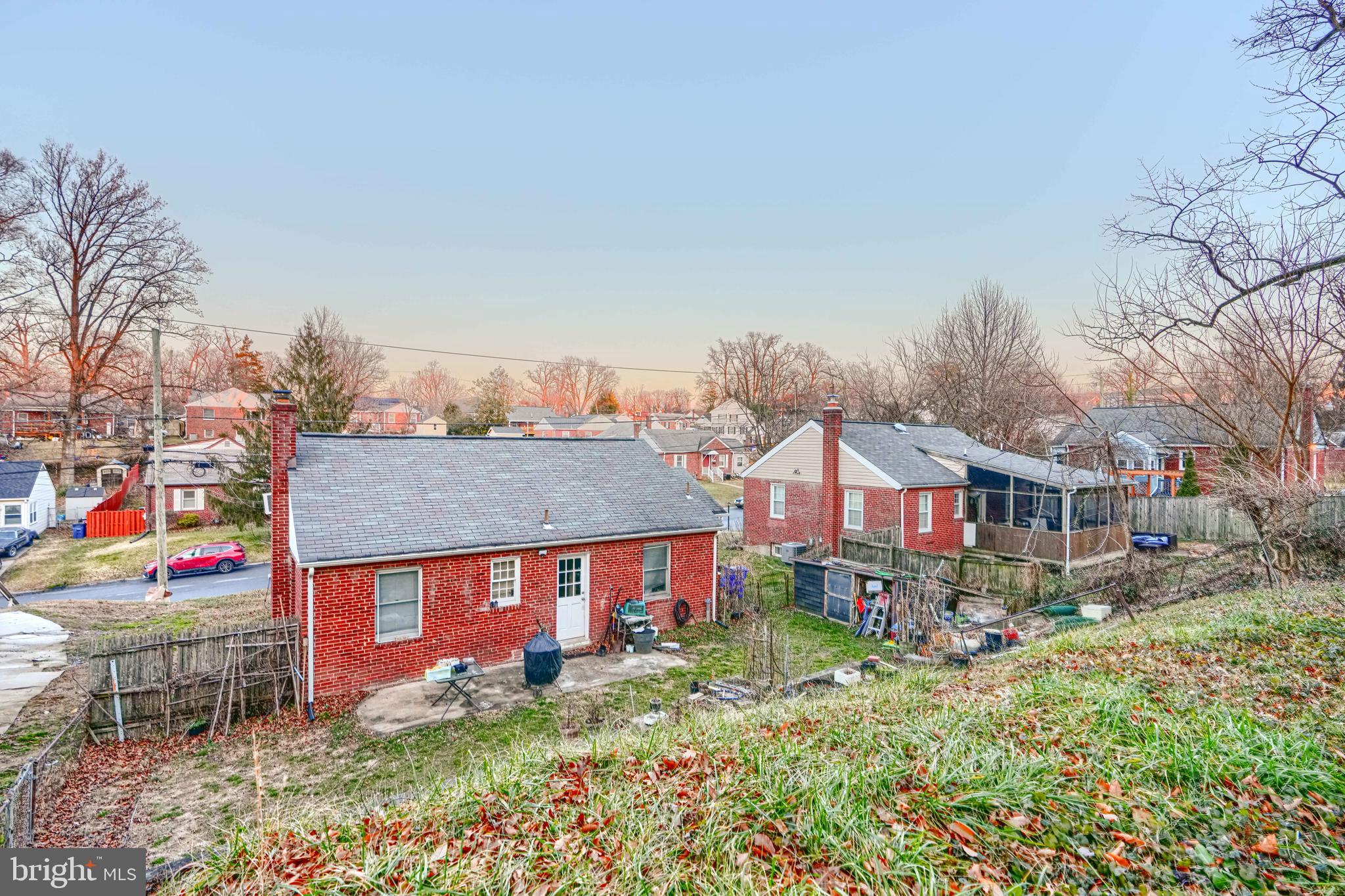2704 Fenimore Road Silver Spring, MD 20902 - Photo 5 of 9 an aerial view of a house with a yard and table and chairs under an umbrella