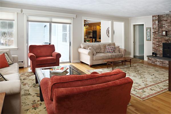 12 Falmouth Road Wellesley, MA 02481 - Photo 3 of 8 a living room with furniture and a large window