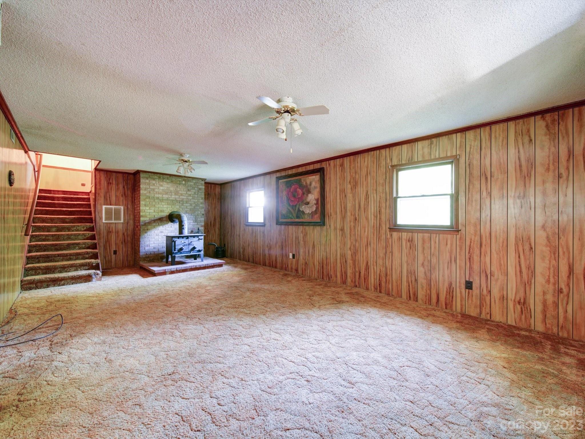 3938 Tater Ridge Road Concord, NC 28025 - Photo 18 of 23 a view of a livingroom with a staircase