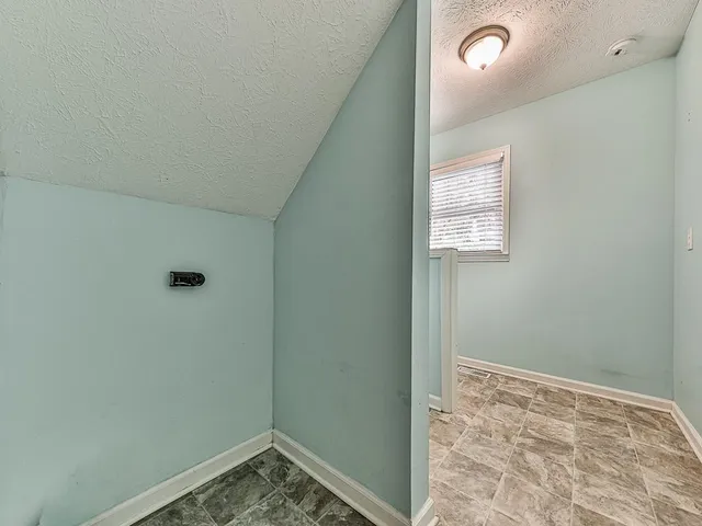 a view of small space with racks on the wall