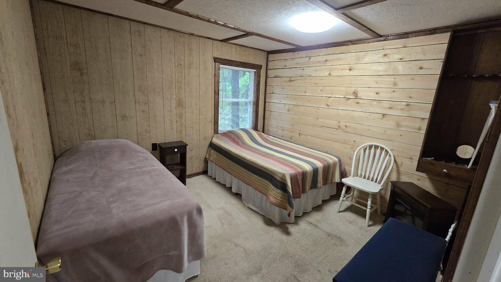 8245 Aughwick Road Fort Loudon, PA 17224 - Photo 10 of 26 a bedroom with a bed and a window