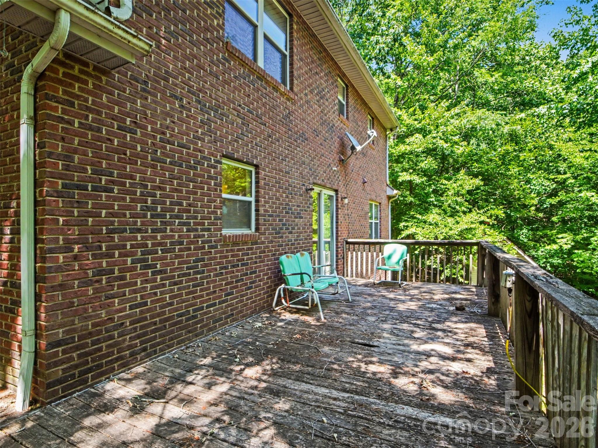 11109 Asbury Chapel Road Huntersville, NC 28078 - Photo 23 of 33 a view of a brick wall with a patio
