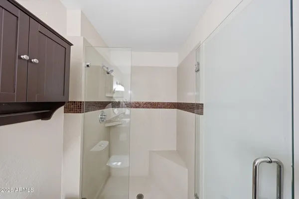 a view of a swimming pool with a patio