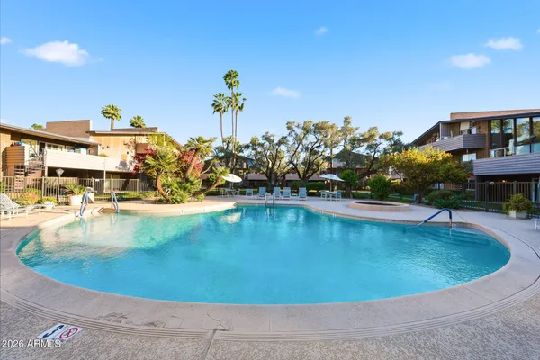 a view of a city with a lake