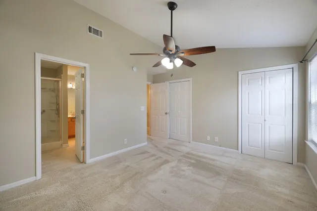 a view of a chandelier fan in a room