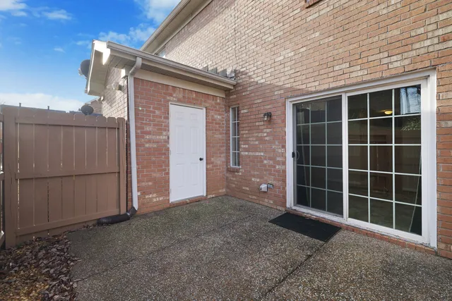 a view of front door with garage