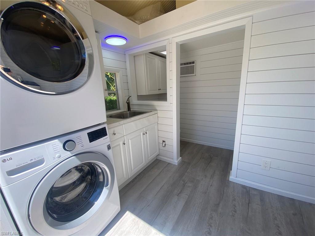 4948 Coach Lane Naples, FL 34114 - Photo 16 of 16 a utility room with dryer and washer