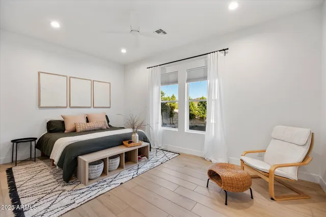 a bathroom with a toilet sink and shower