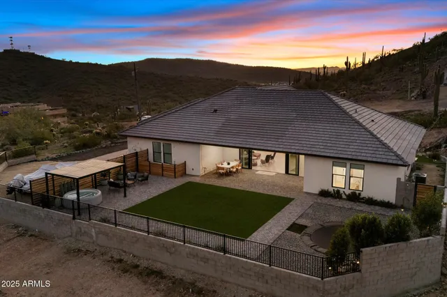a view of a house with a swimming pool
