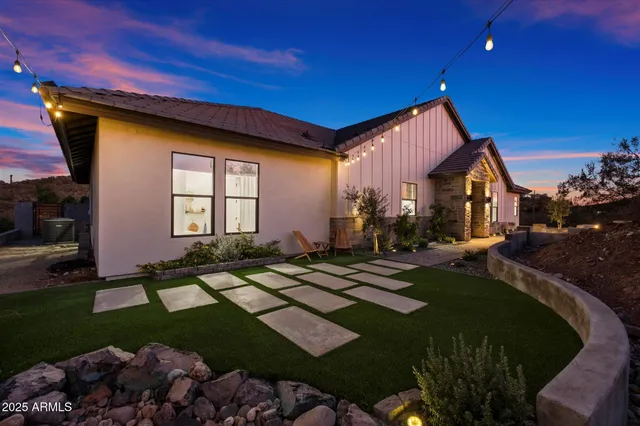 a backyard of a house with lots of green space