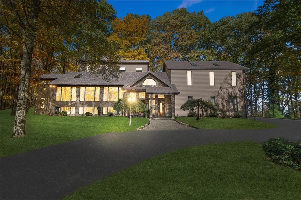 1309 Chestnut Ridge Road Penn Run, PA 15765 - Photo 2 of 45 a front view of house with yard and green space
