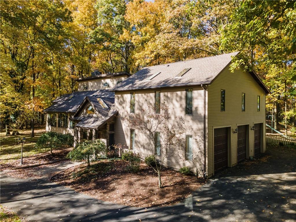 1309 Chestnut Ridge Road Penn Run, PA 15765 - Photo 4 of 45 a view of a house with a tree