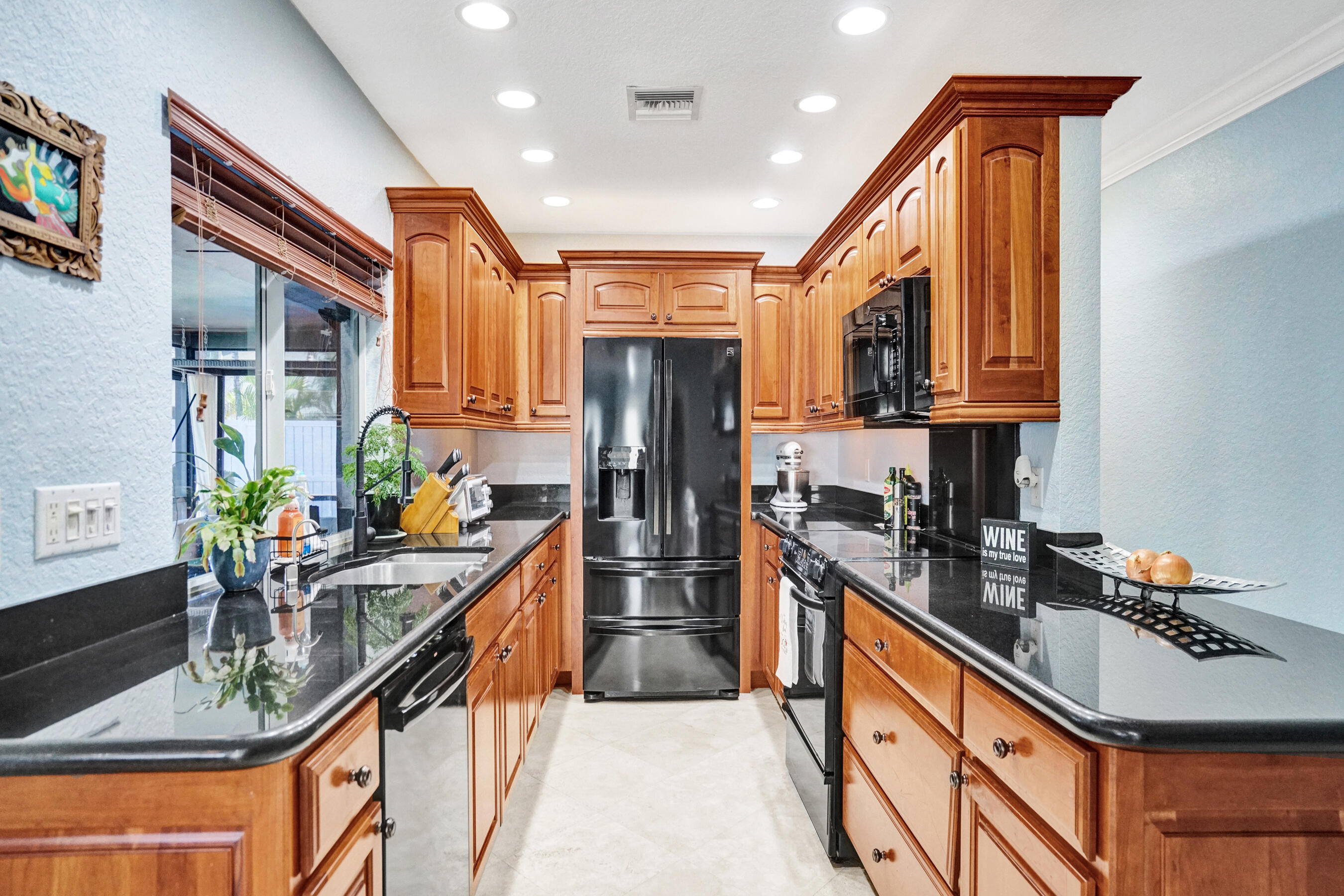 2750 Northeast 45th Street Lighthouse Point, FL 33064 - Photo 11 of 60 Kitchen w/ SS Appliances
