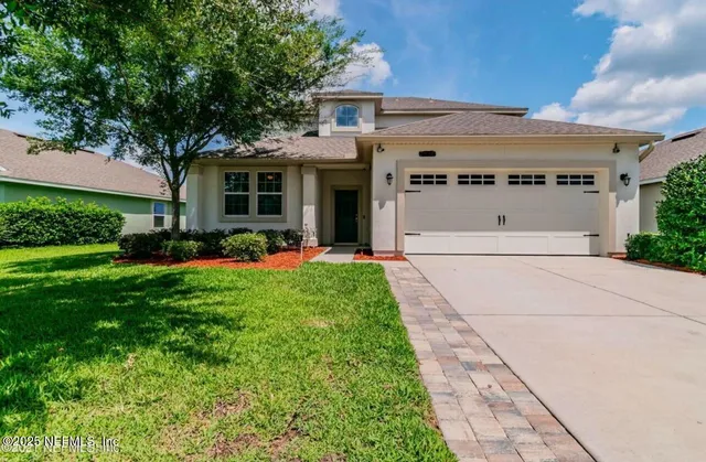 a front view of house with yard