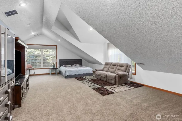 a wooden bench sitting in front of a house
