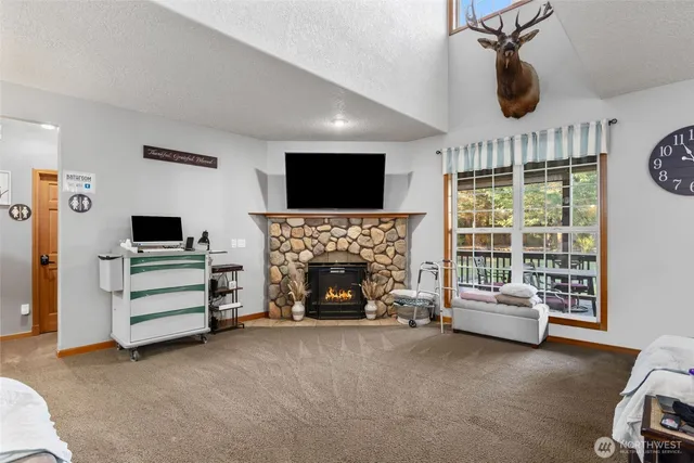 an aerial view of a house with yard swimming pool and outdoor seating