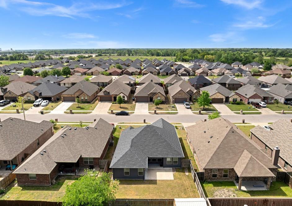 118 Cherokee Street Greenville, TX 75402 - Photo 18 of 19 an aerial view of residential houses with outdoor space