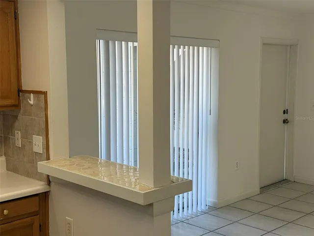 a view of swimming pool from a lake view