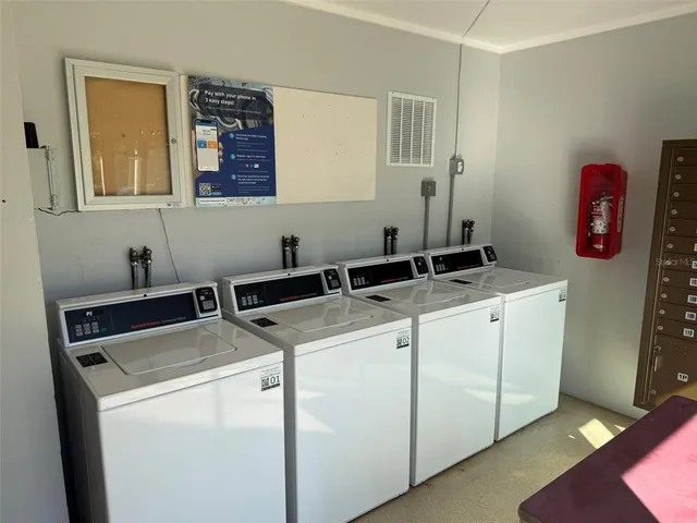 a view of a yard with cars